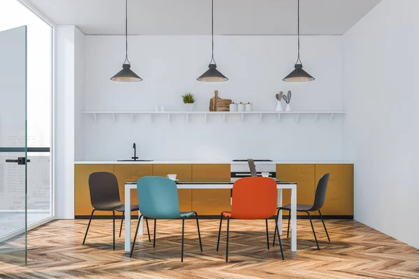 Beige countertop kitchen with colored chairs — Stock Photo, Image