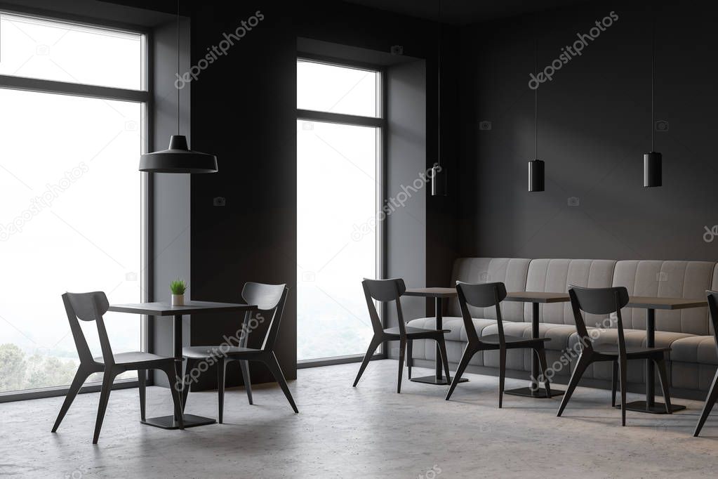 Loft style cafe interior with sofas and chairs