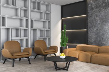 Kanepe ve kitaplık ile beton oturma odası