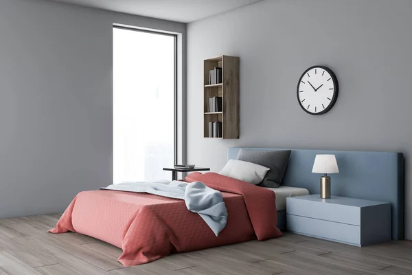 Gray bedroom corner with shelf and clock — Stock Photo, Image