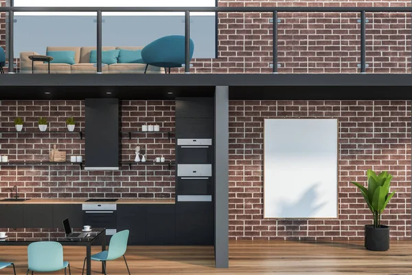 Brick office lounge and kitchen with poster