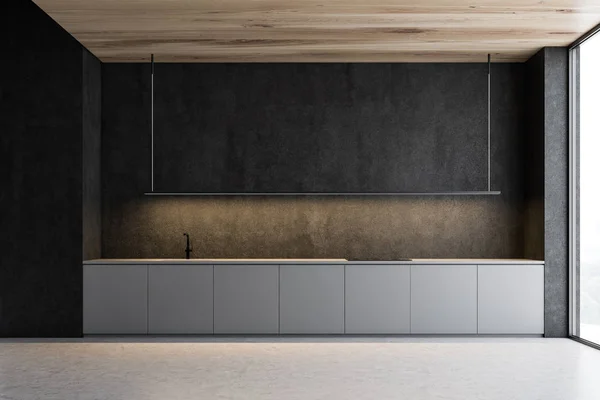 Intérieur de cuisine sombre avec comptoirs gris — Photo