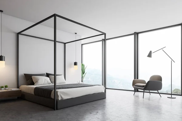 Vitt loft sovrum interiör med fåtölj — Stockfoto