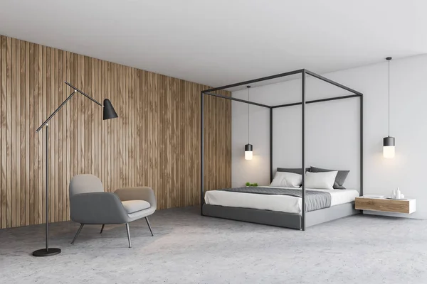 Rincón dormitorio blanco y de madera con sillón — Foto de Stock