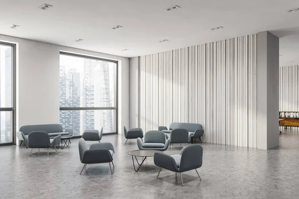 Hjørne av hvitt kontor med sofaer – stockfoto