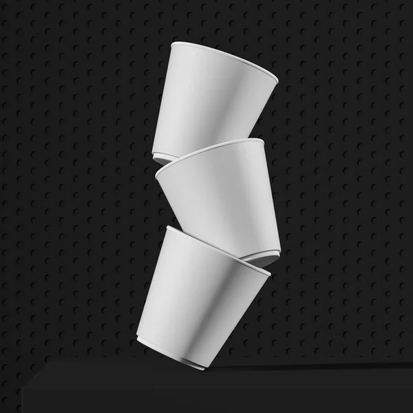 Stack of white paper cups falling on black table — Stock Photo, Image