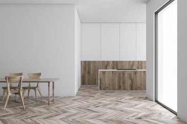 Beyaz mutfak, ahşap tezgah ve masa.