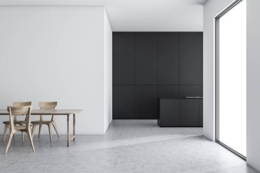 Masalı beyaz ve koyu gri mutfak.