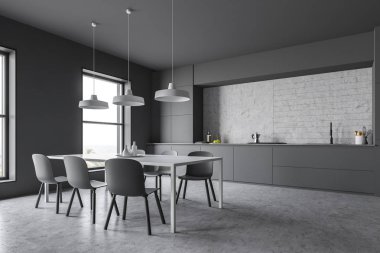 Mutfak tezgahı ve tablo ile gri mutfak köşesi