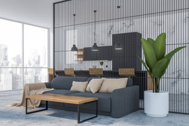 Beyaz mermer oturma odası ve mutfak köşesi.