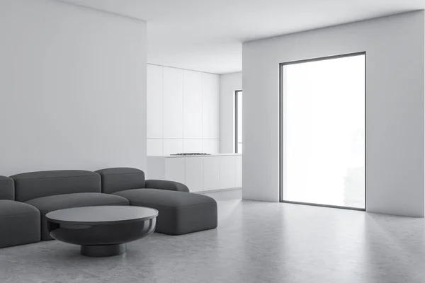 Белая гостиная и кухня с диваном — стоковое фото