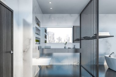 Beyaz mermer banyo içi, küvet ve tuvalet.