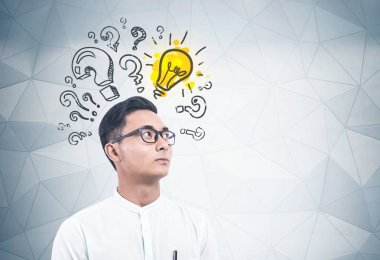 Ciddi Asyalı adam çözüm arıyor