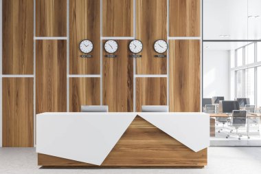 Ahşap ve beyaz ofiste resepsiyon masası, saatler