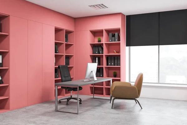Pink CEO office corner with armchair