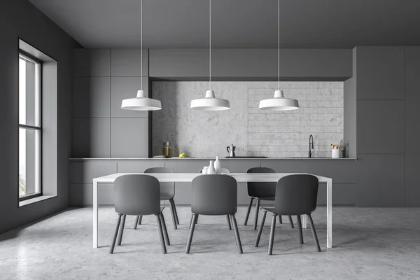 Gray kitchen with countertops and table — Stock Photo, Image