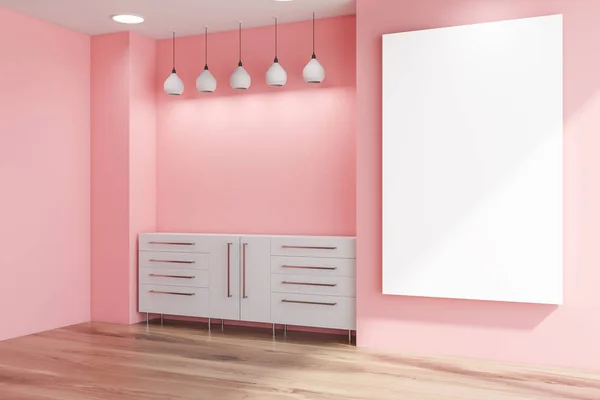 캐비닛과 포스터가 있는 분홍색 거실 코너 — 스톡 사진