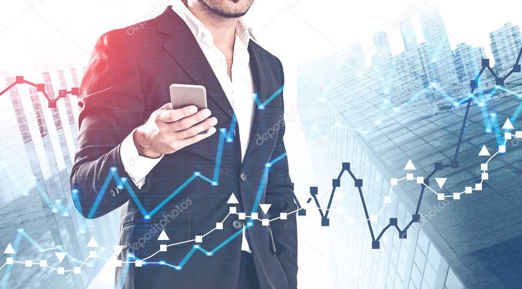 Man with phone, forex graph