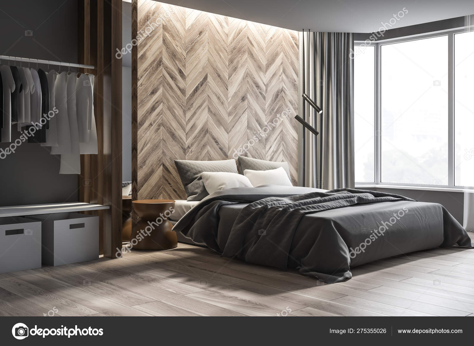 Gray And Dark Wooden Bedroom Corner Wardrobe Stock Photo