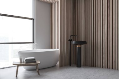 Beyaz ve ahşap banyo köşesi, küvet, lavabo