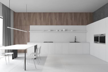 Ahşap ve beyaz mutfak, tezgah ve masa.