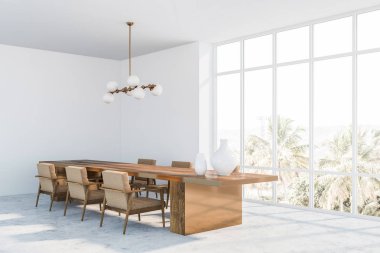 Koltuklu beyaz yemek odası köşesi