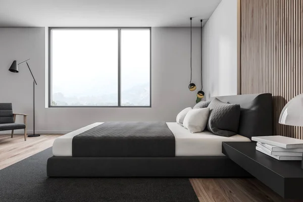 Zijaanzicht van witte en houten slaapkamer — Stockfoto