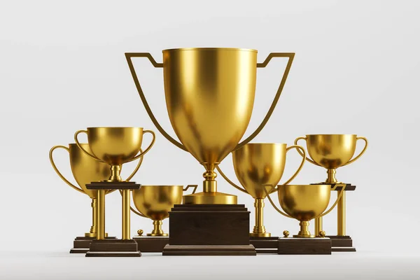 Golden champion trophies on white — Stock Photo, Image