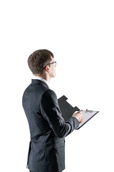 Businessman with clipboard taking notes — Stock Photo, Image