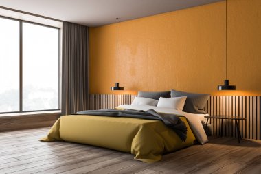 Turuncu ve ahşap yatak odası köşesi