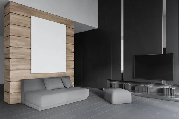 Wooden living room with TV, poster and sofa