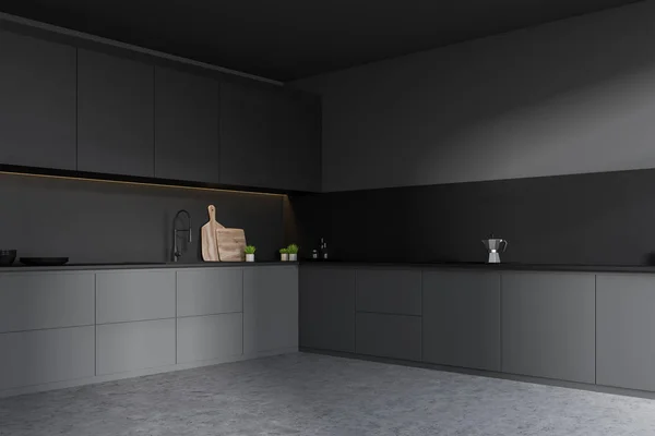 Donkergrijze keukenhoek met werkbladen — Stockfoto