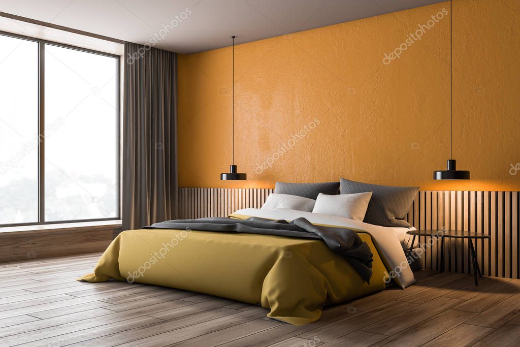 Orange and wooden bedroom corner