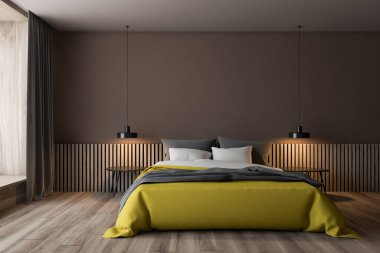 Sarı yataklı kahverengi yatak odası iç