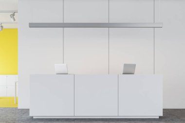 Beyaz ve sarı ofis resepsiyonu