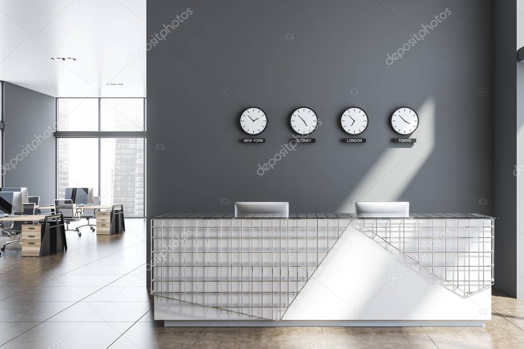 Gray and metal office reception desk with clocks