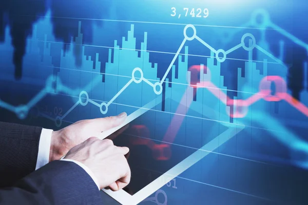 Man in suit with tablet, forex graphs — Stock Photo, Image