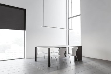 Minimalist beyaz yemek odası köşesi