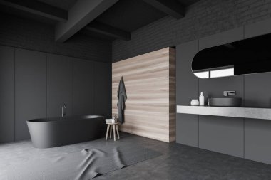 Gri ve ahşap banyo köşesi, lavabo ve küvet