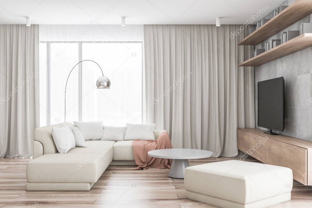 White living room with sofa and TV