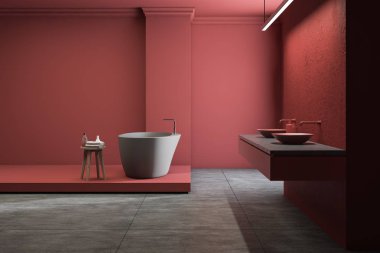 Kırmızı banyo, lavabo ve küvetin yan görünümü