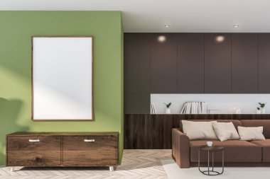 Kanepe, dolap ve poster ile yeşil oturma odası