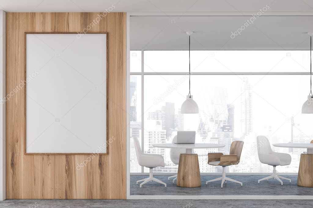 Light wooden coworking office with poster