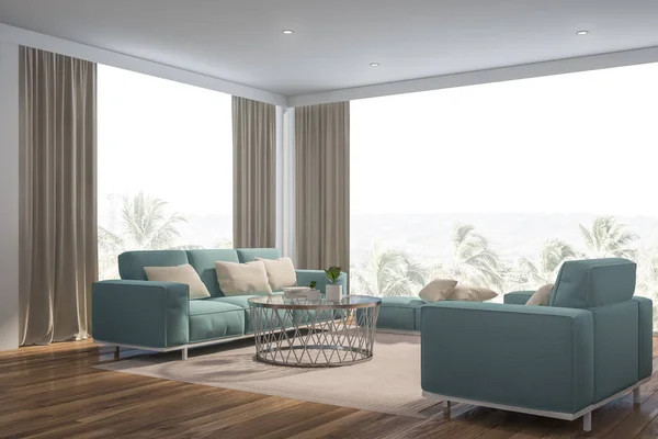 Panoramic white living room corner, blue sofa