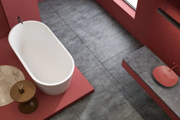 Topputsikt över röda badrum med handfat och badkar — Stockfoto