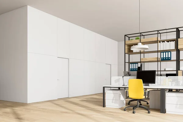 White open space office corner, bookcase and doors