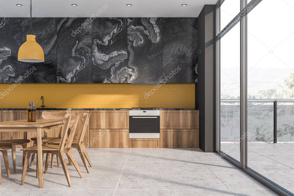 Yellow and black marble kitchen, table and balcony