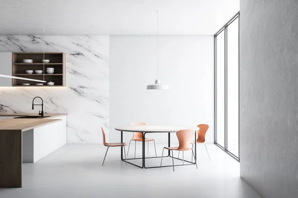 Cozinha em mármore branco com mesa e ilha — Fotografia de Stock