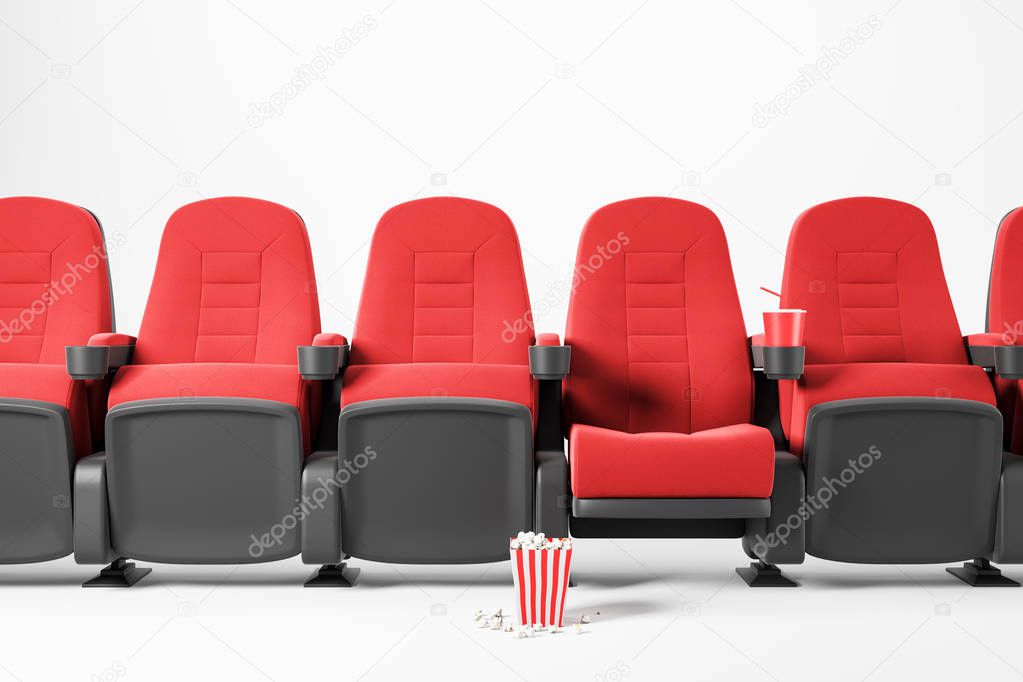 Row of red cinema chairs on white background