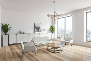 Resimli beyaz oturma odası köşesi